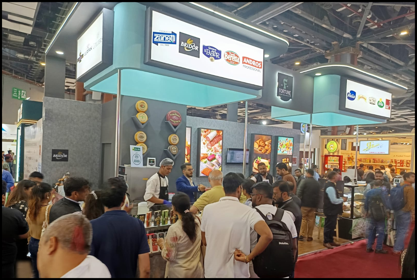 Creative exhibition stall fabrication with corporate branding