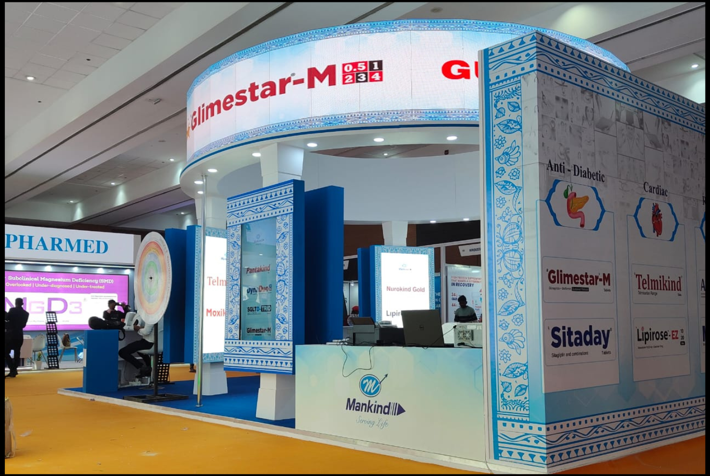 Exhibition setup with digital screens and immersive brand experience